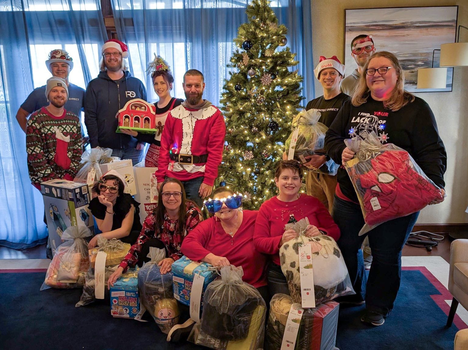 Rentec Direct employees collecting donations for Toys for Tots and Angel Tree